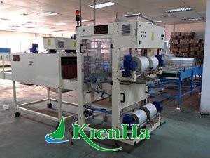 FILM COVERING AND FILM SHINKING MACHINE
